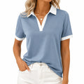Polo femme L bleu acier et blanc en tissu fluide à col contrasté manches courtes